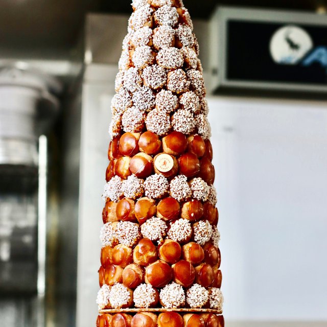 Reaching towards the sky, our Croquembouche Cake is a  height of sweetness that will making your special event truly unforgettable!β 
.β 
....